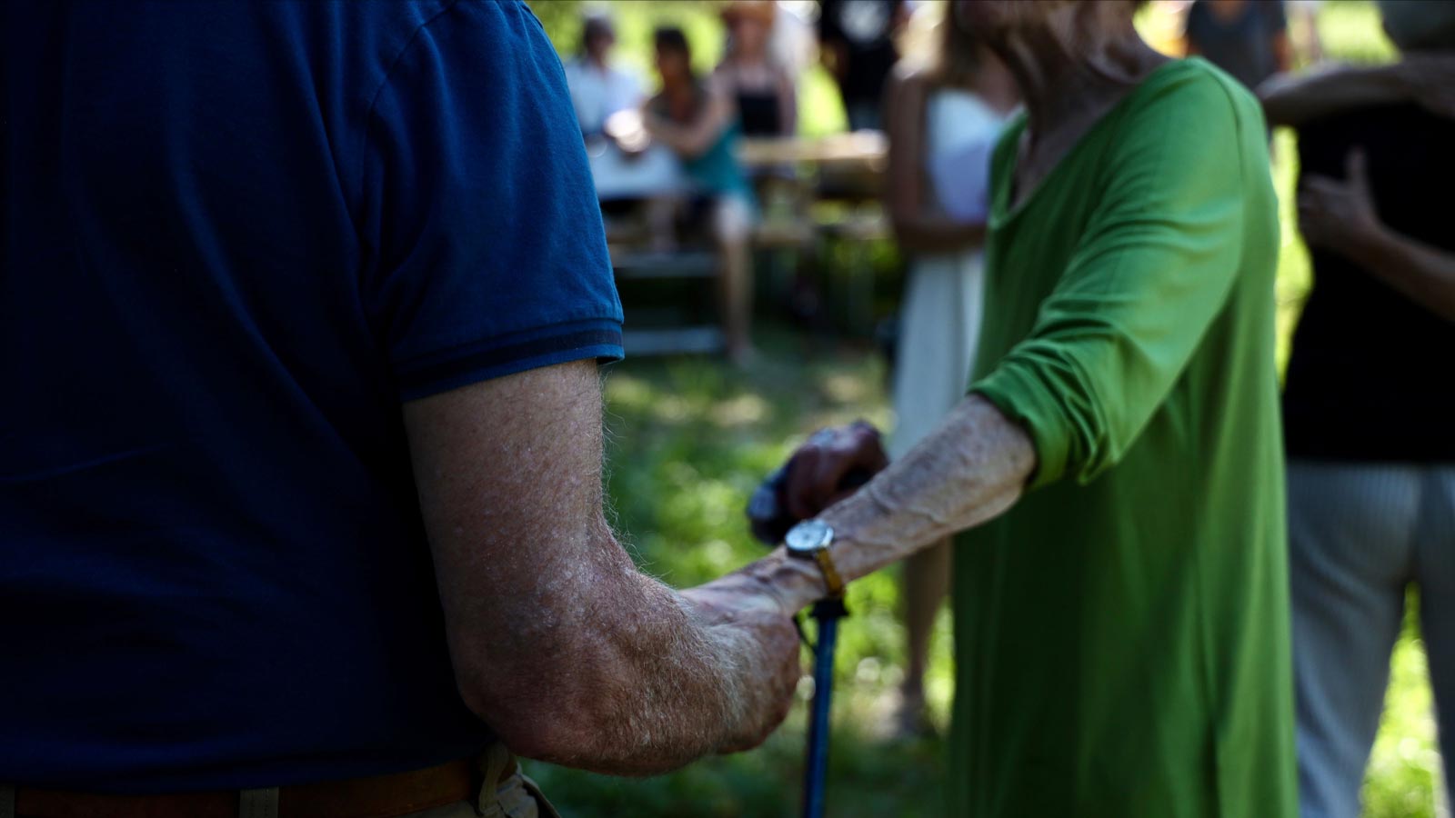 friends greeting each other at natural burial ground event